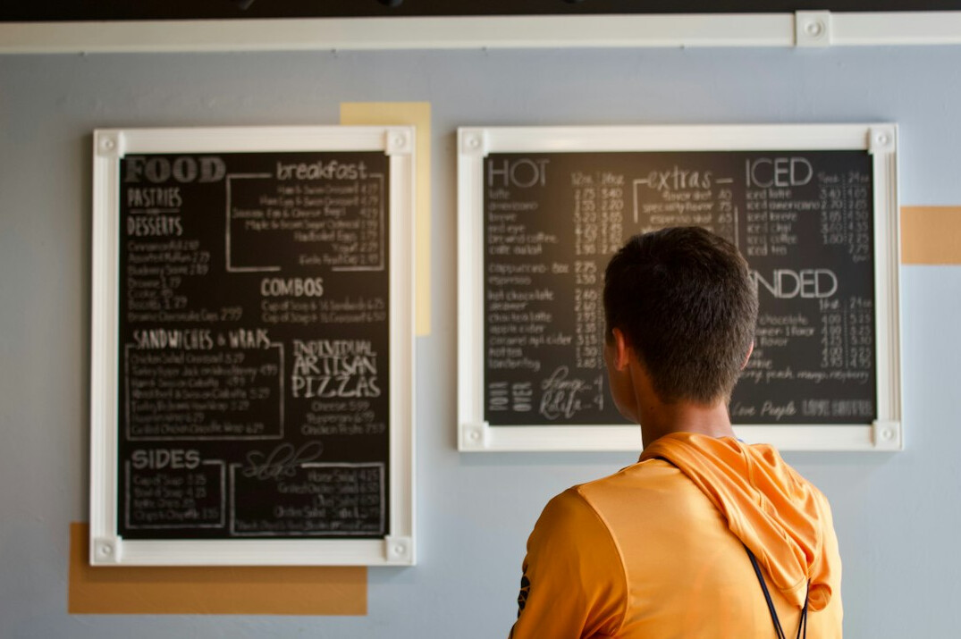 Management board reviewing a strategic roadmap on a wall